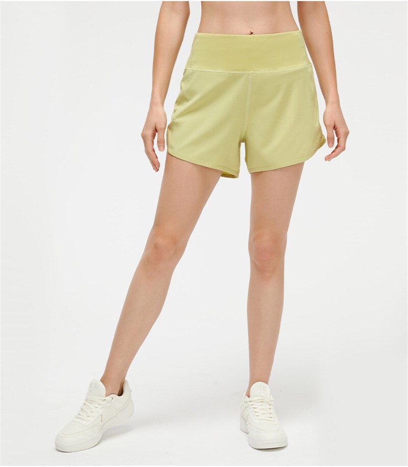 Women Back Zipper Pockeks Sports Shorts light yellow